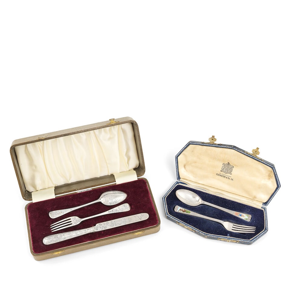 A cased silver and enamel spoon and fork 'nursery rhyme' christening set Elkington & Co, Birming... (1 of 2)