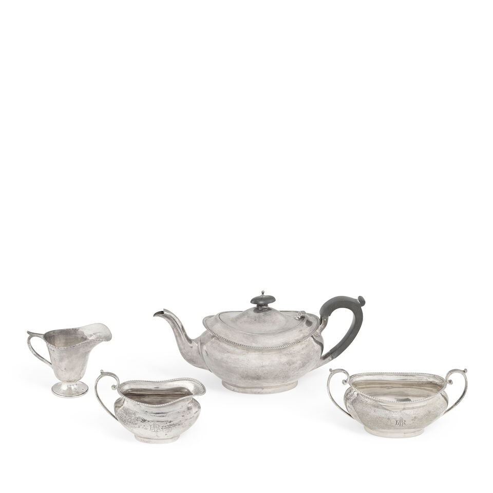 A silver three-piece tea service, together with a single silver cream jug service, Barker Brothe... (1 of 1)