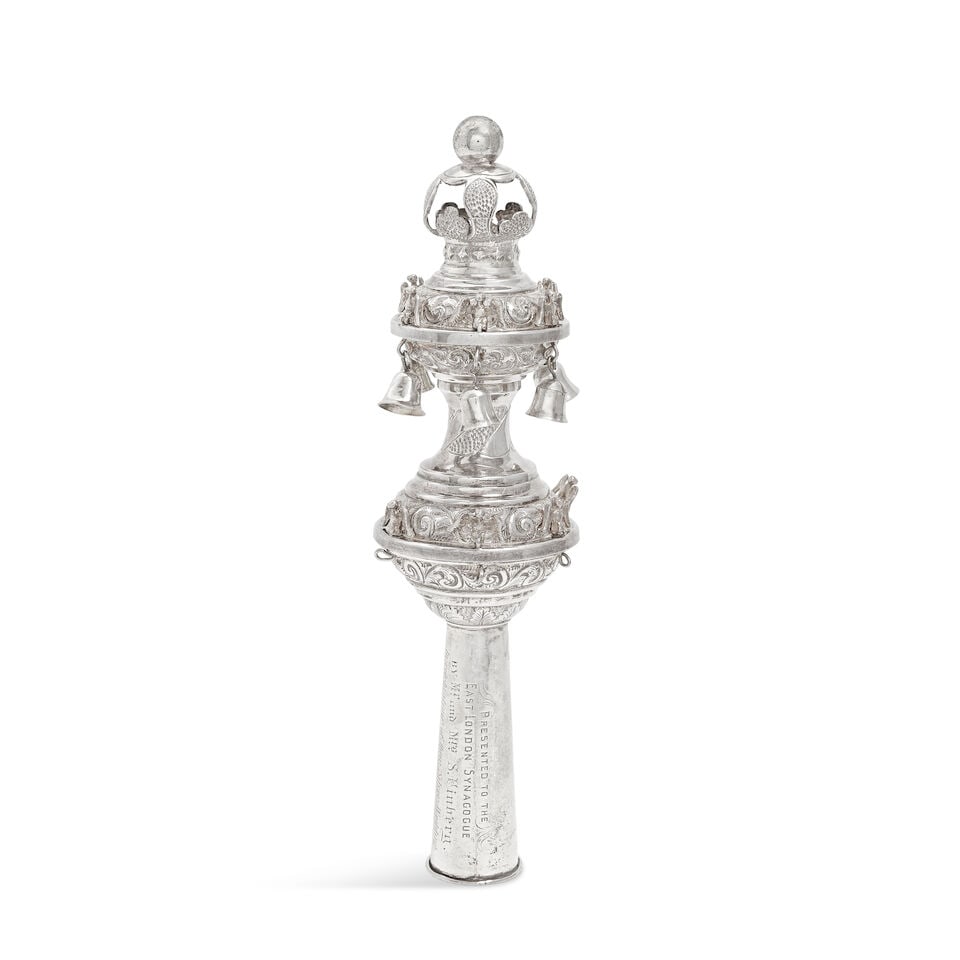 Judaica: An Edwardian silver torah finial Atkin Brothers, London 1902: Judaica: An Edwardian silver torah finial Atkin Brothers, London 1902 Of typical form, with crown finial, with bells below bird finials, with baluster lower body with repeated bird finials, with prese