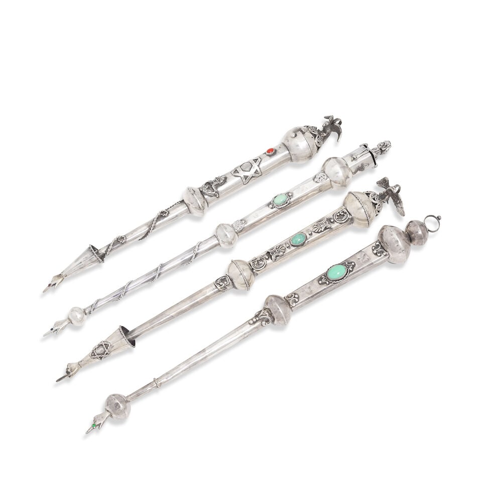 Judaica: A group of four silver yad / torah pointers (1 of 2)
