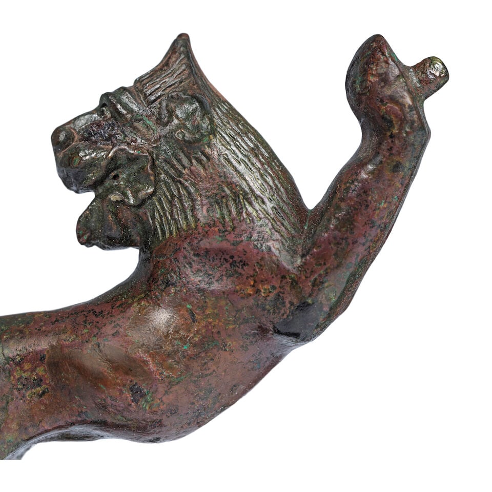 A small Etruscan bronze handle in the form of a leaping lion - 2