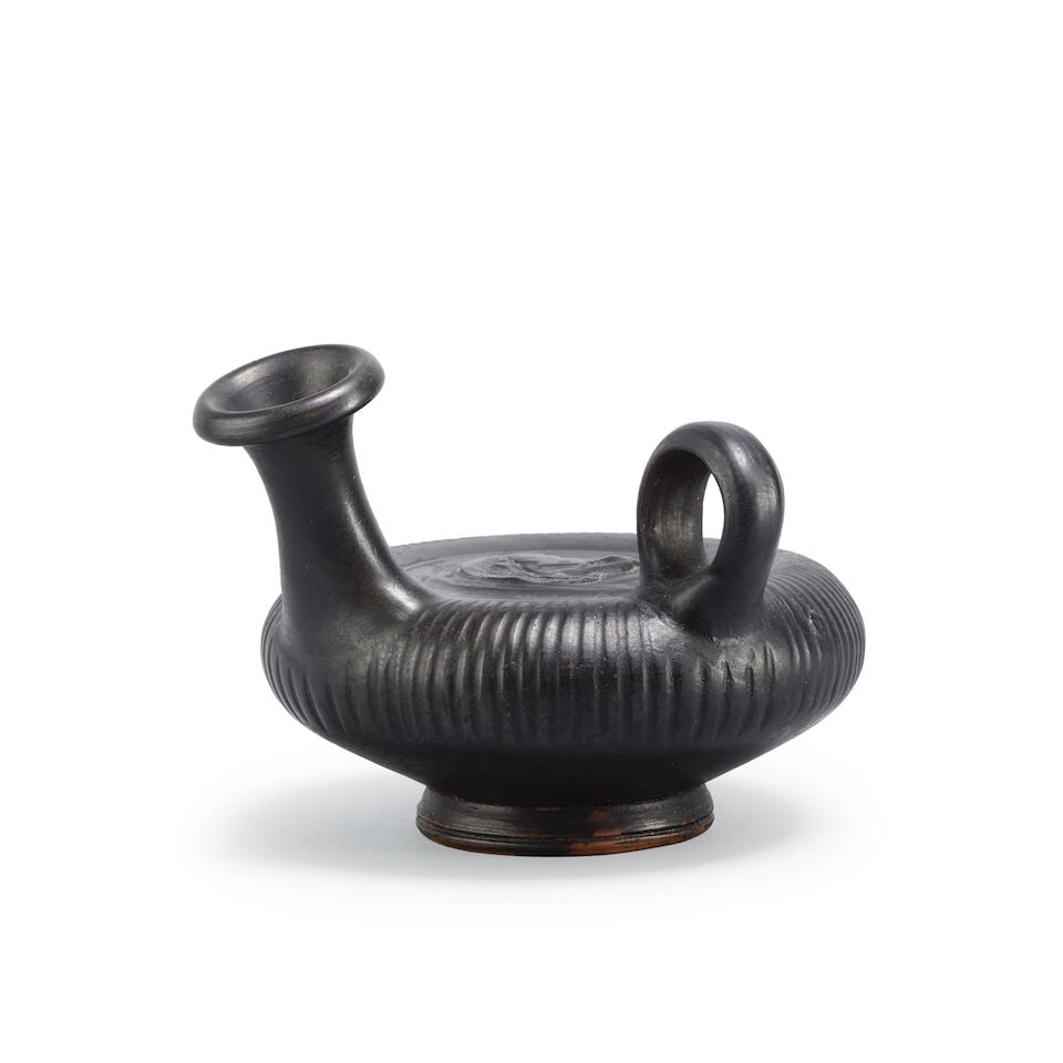 A Greek black-glazed pottery guttus with recumbent deer - 2