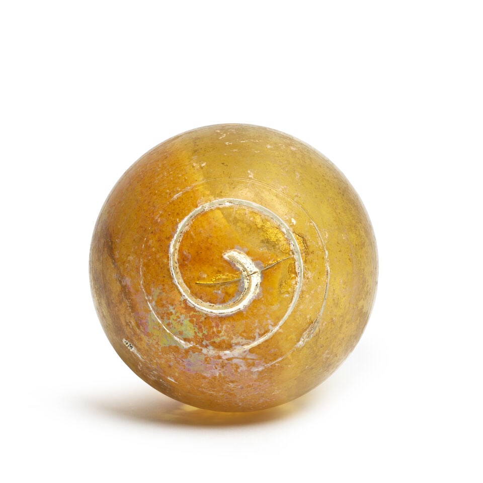 A Roman pale amber glass bottle - 2