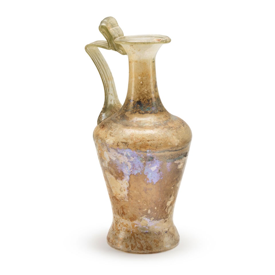 A Roman pale green glass jug with thumb-rest - 2