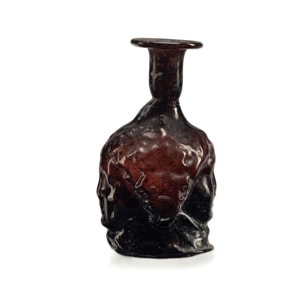 A Roman purple glass Janus-headed flask - 2