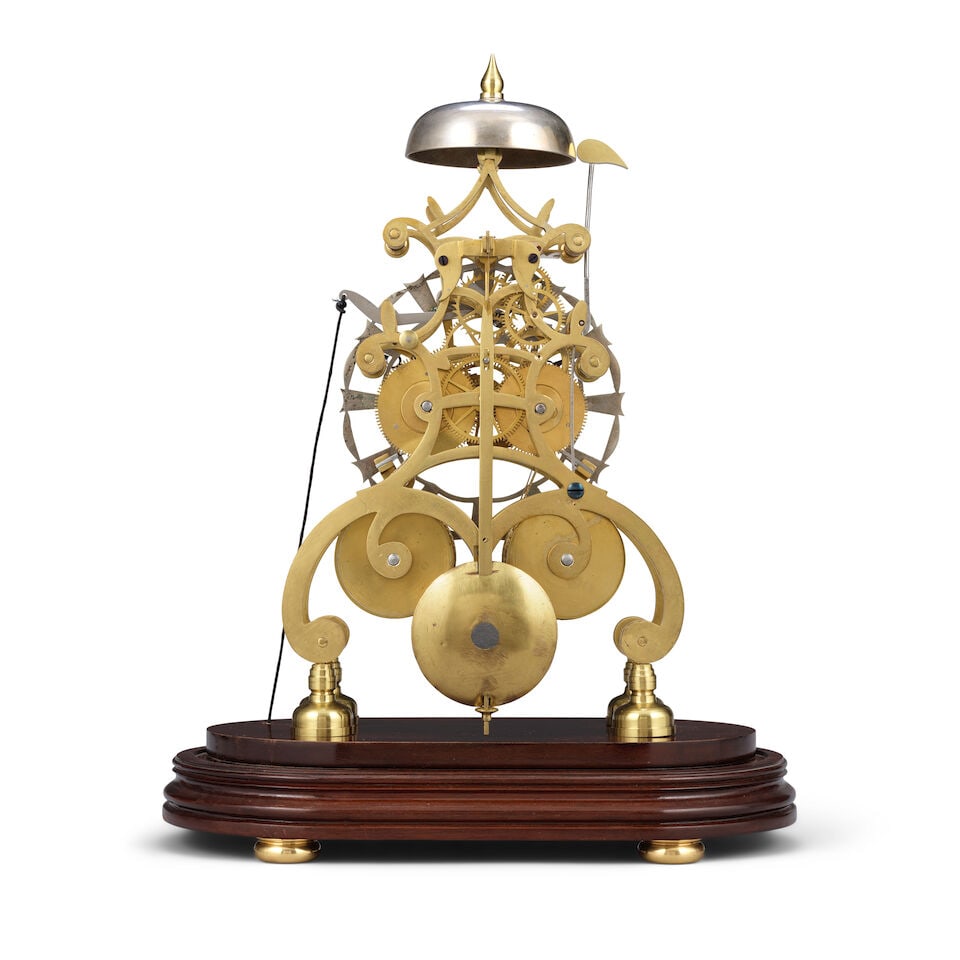 A late 19th century brass striking skeleton clock on later mahogany base - 2