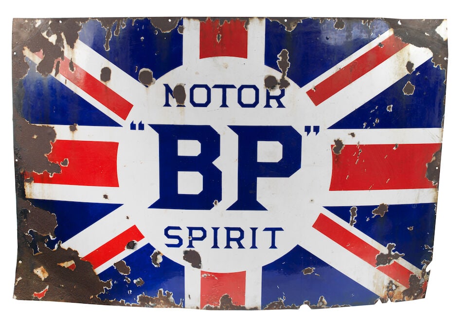 A large ''BP' Motor Spirit' enamel sign,: A large ''BP' Motor Spirit' enamel sign, by Bruton & Sons, single-sided, in red, white and blue enamel with Union Jack design, weathered with some loss to enamel and rusting in places, 122 x 183cm. Fo
