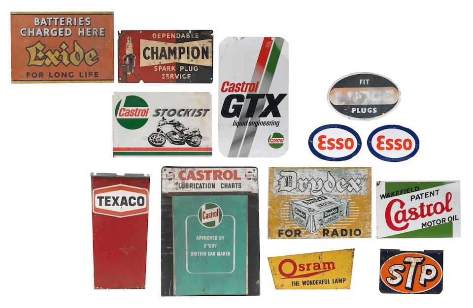 Assorted oil product and motoring accessories garage advertising signs, ((13)): Assorted oil product and motoring accessories garage advertising signs, including two oval Esso enamel signs, single-sided, 23 x 33cm; a 'Wakefield Patent Castrol Motor Oil' enamel sign, single-sided,