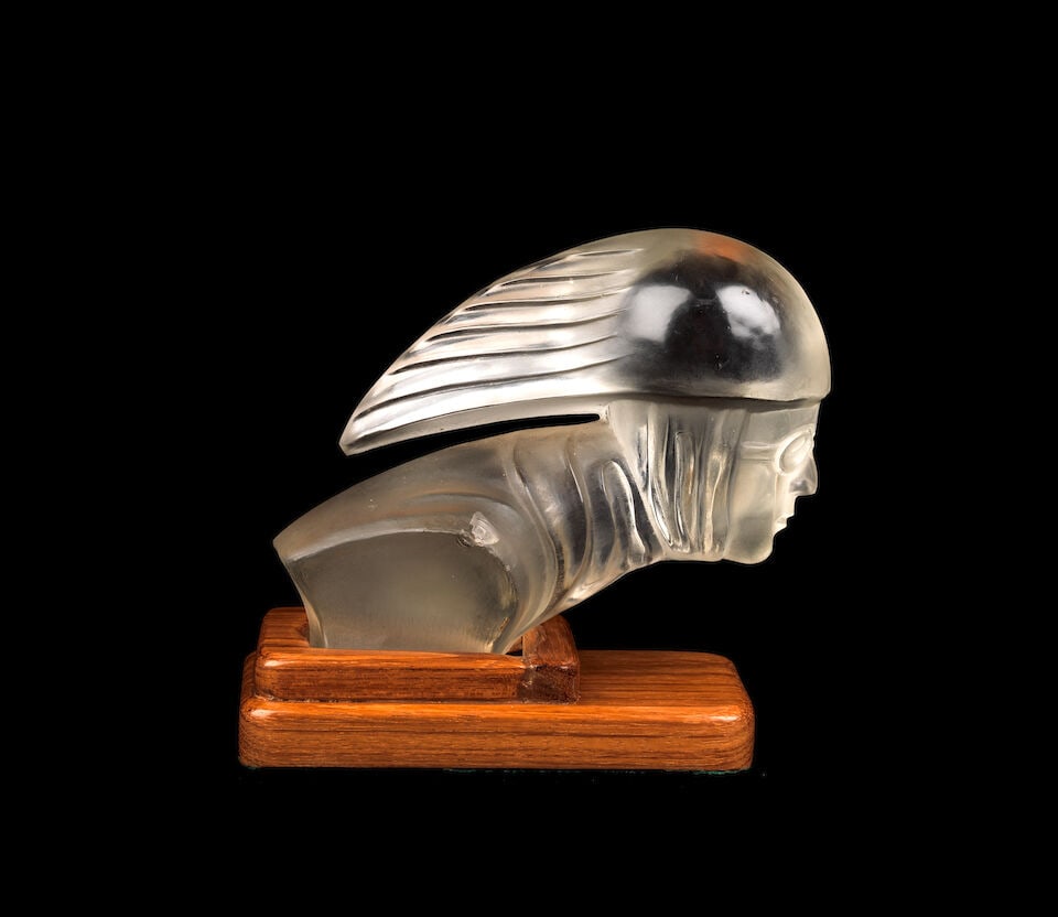 A 'Racing Driver' glass mascot by Desna, retailed as Red Ashay, (1 of 1)