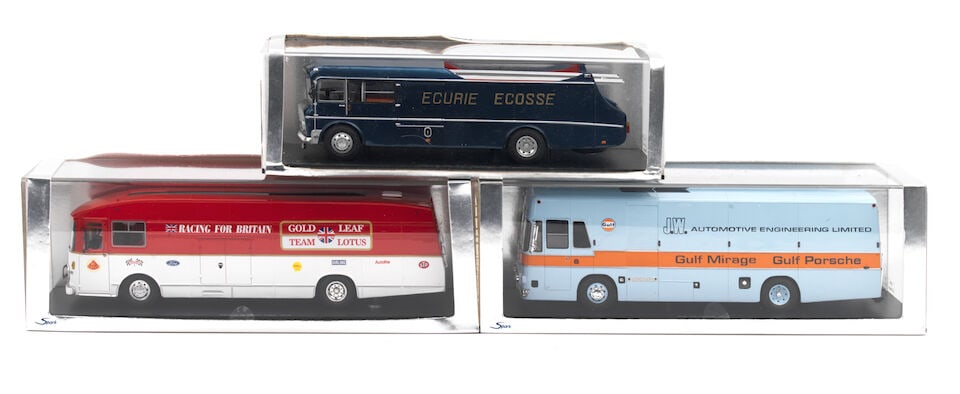 Three boxed 1:43 scale die-cast models of 1959 Ecurie Ecosse, 1970 Gold Leaf Lotus, and 1971 Gul...: Three boxed 1:43 scale die-cast models of 1959 Ecurie Ecosse, 1970 Gold Leaf Lotus, and 1971 Gulf Mirage/Porsche race team transporters, by Spark Models, each in plastic case with outer sleeve, compri