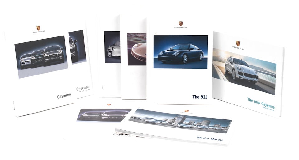 Promotional sales literature for Porsche 911 and Cayenne models, ((8)): Promotional sales literature for Porsche 911 and Cayenne models, both hard-back and soft-back publications comprising three for early 2000s 911 and 911 Turbo; and three for Cayenne and New Cayenne, wi