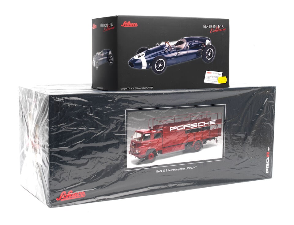 A boxed 1:18 scale die-cast model of a MAN 635 Porsche Renntransporter by Schuco, ((2)) (1 of 1)