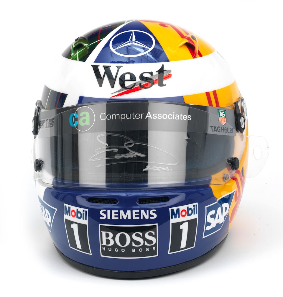A 2004 David Coulthard Hungarian Grand Prix replica promotional helmet, with signed visor tear-off, - 2