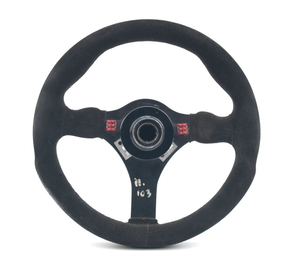 A Ferrari F1/87 steering wheel, used by Michele Alboreto, - 2