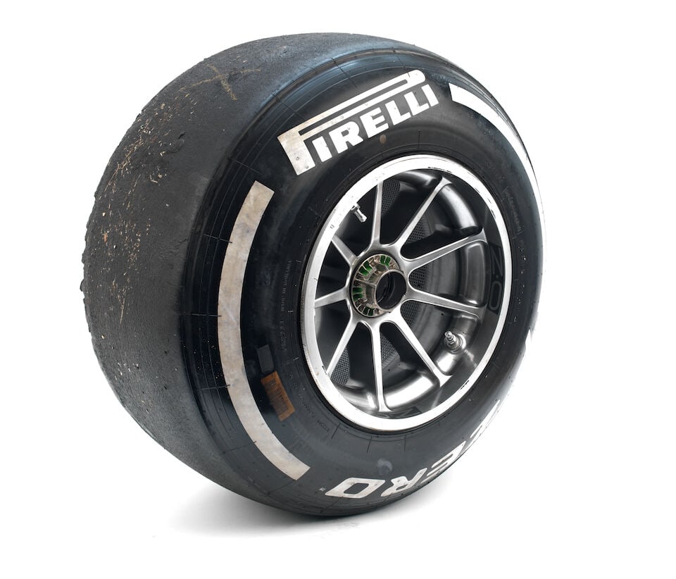 A Red Bull Racing RB16 front right wheel with Pirelli tyre, from Max Verstappen's car,: A Red Bull Racing RB16 front right wheel with Pirelli tyre, from Max Verstappen's car, silver alloy by OZ wheels, with sticker on inside with Dutch flag, FL and No.33, numbered to the rim 034 20