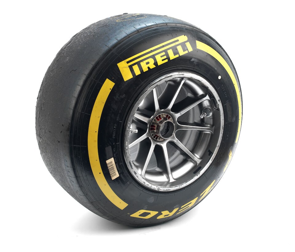 A Red Bull Racing RB16 front left wheel with Pirelli tyre, from Max Verstappen's car,: A Red Bull Racing RB16 front left wheel with Pirelli tyre, from Max Verstappen's car, silver alloy by OZ wheels, with sticker on inside with Dutch flag, FL and No.33, numbered to the rim 468 19 #147,