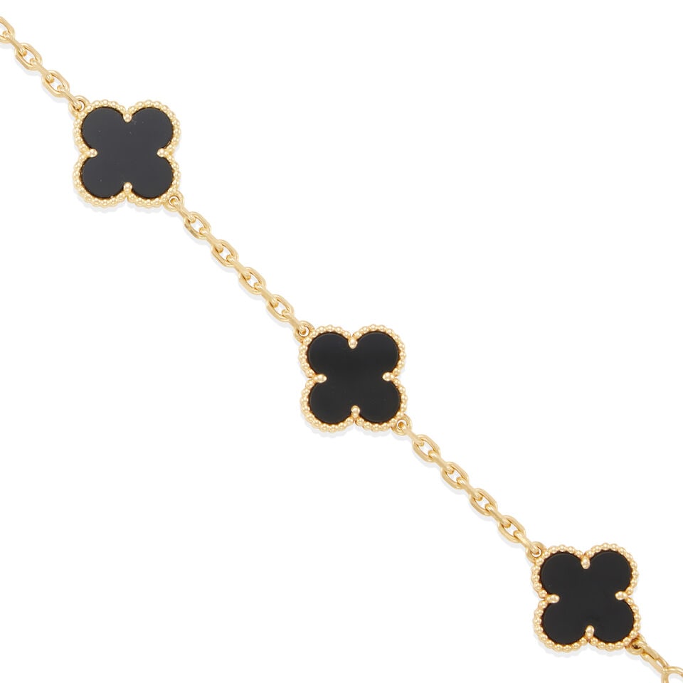 VAN CLEEF & ARPELS: 18K GOLD AND ONYX 'ALHAMBRA' BRACELET - 2