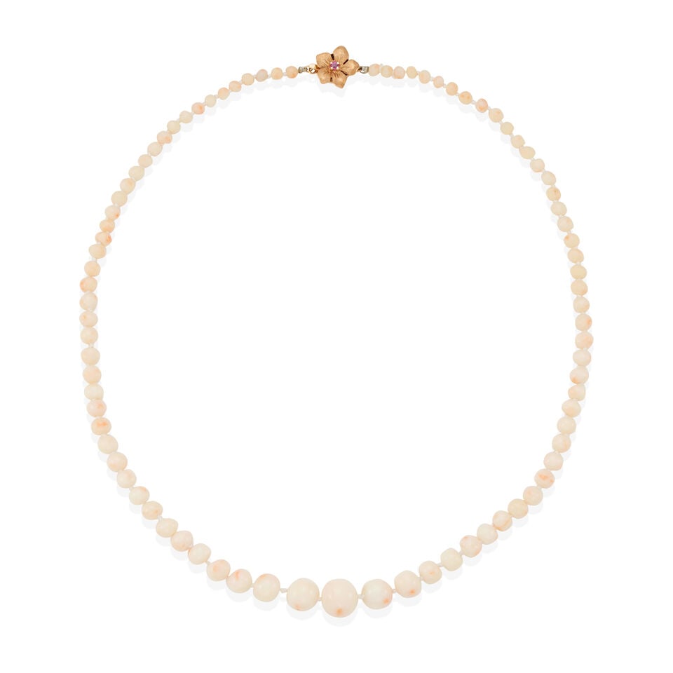 14K GOLD AND CORAL NECKLACE: 14K GOLD AND CORAL NECKLACE •14k yellow gold •Numerous spherical and semi-spherical drilled coral beads measuring from approximately 3.90 mm to 11.50 mm each in diameter •1 round
