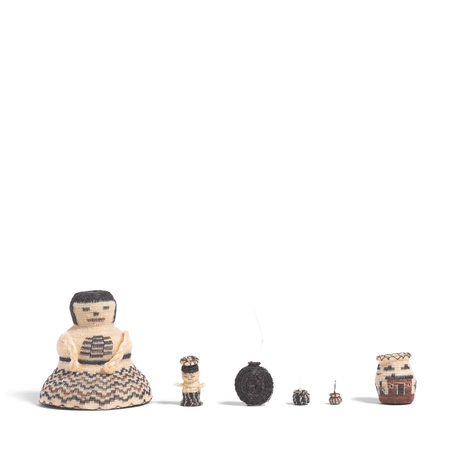 A collection of Tohono O'odham (Papago) miniature horsehair basketry items: A collection of Tohono O'odham (Papago) miniature horsehair basketry items Comprising two figures or dolls; two diminutive lidded containers; a degikup-style bowl; a pictorial olla; a model canteen; a