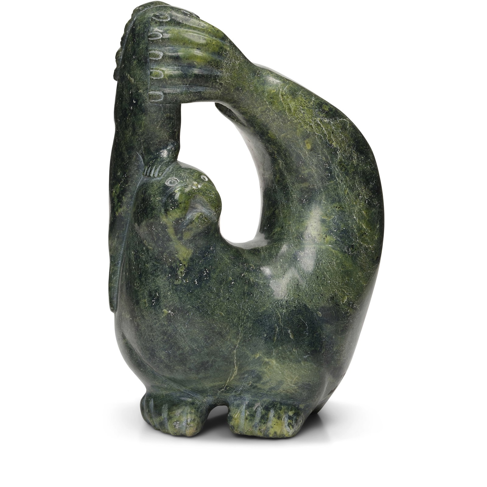 A Kaka Ashoona sculpture, 'Walrus and Seal,' circa 1989: Kaka Ashoona Inuit, Kinngait (Cape Dorset), (1928-1996), 'Walrus and Seal,' circa 1989, carved stone sculpture, signed in Roman: 'KAKA.' height 17 3/4in, width 11in Footnotes: Provenance Feheley Fine