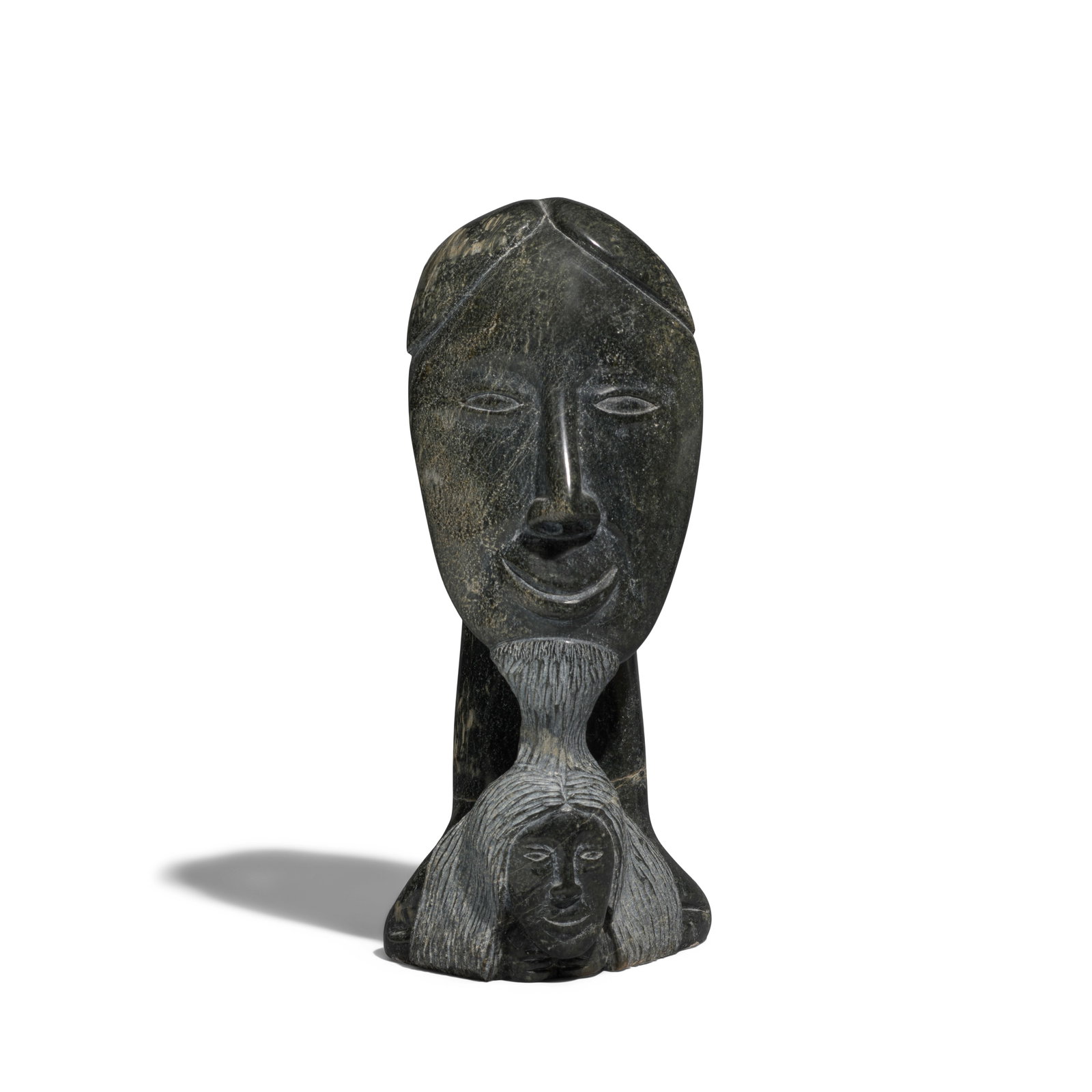 A Pitseolak Niviaqsi stone sculpture: Pitseolak Niviaqsi, R.C.A. Inuit, Kinngait (Cape Dorset), (1947-2015), untitled, stone sculpture, depicting Sedna or a sea creature lying on her arms and with upraised body, her tail transforming into