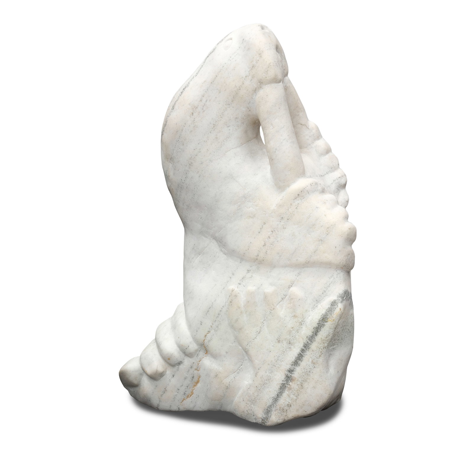 An Inuit stone sculpture: An Inuit stone sculpture Walrus transformation figure, apparently unsigned, raised on a black marble base. height (not including base) 26 1/2in, width 15 1/2in Footnotes: Provenance Property from the