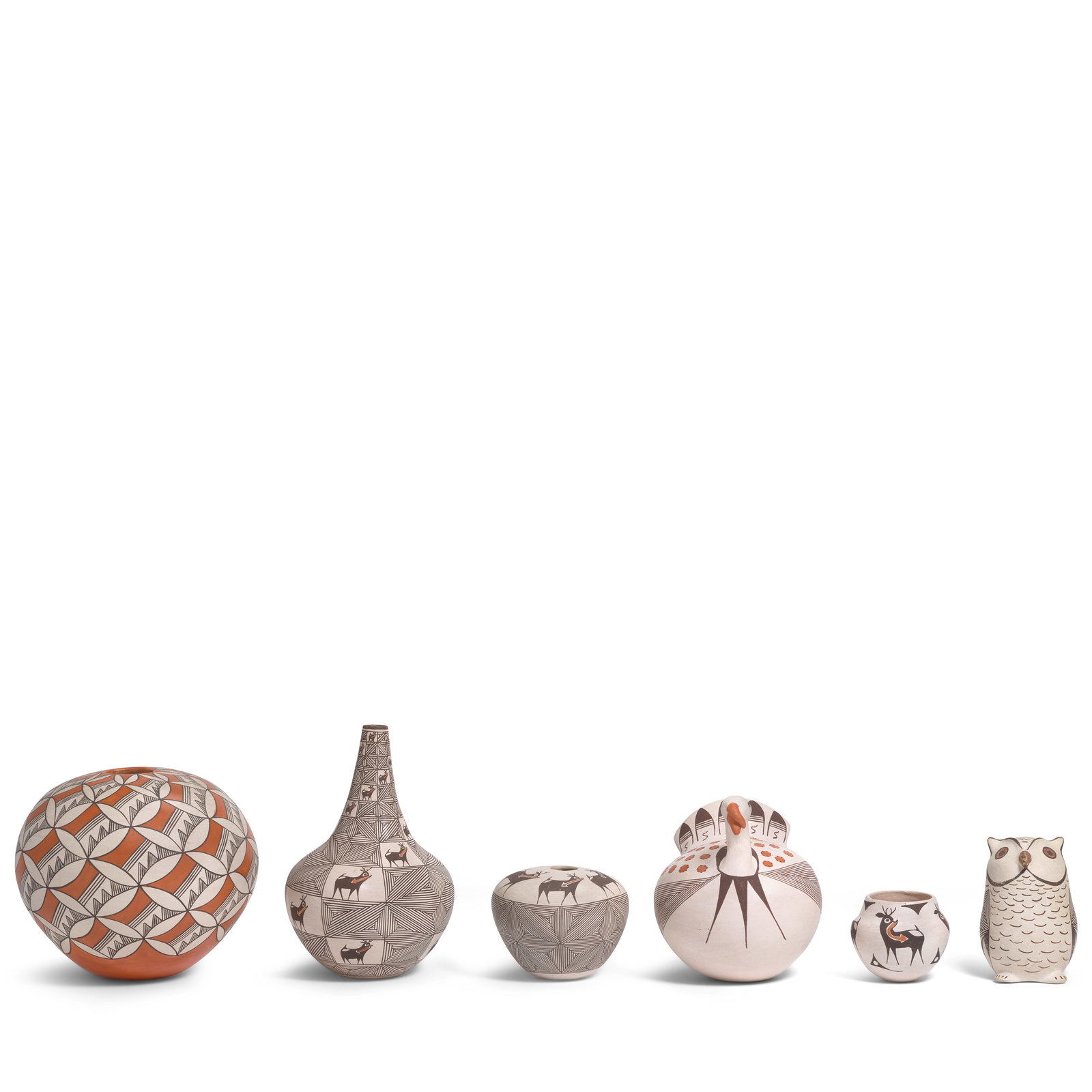Six Rose Chino Garcia polychrome pottery objects: Rose Chino Garcia Acoma Pueblo, (1928-2000), six polychrome pottery objects, including three jars (two with heartline deer), a tall-necked vase with heartline deer, a turkey, and an owl, each signed o