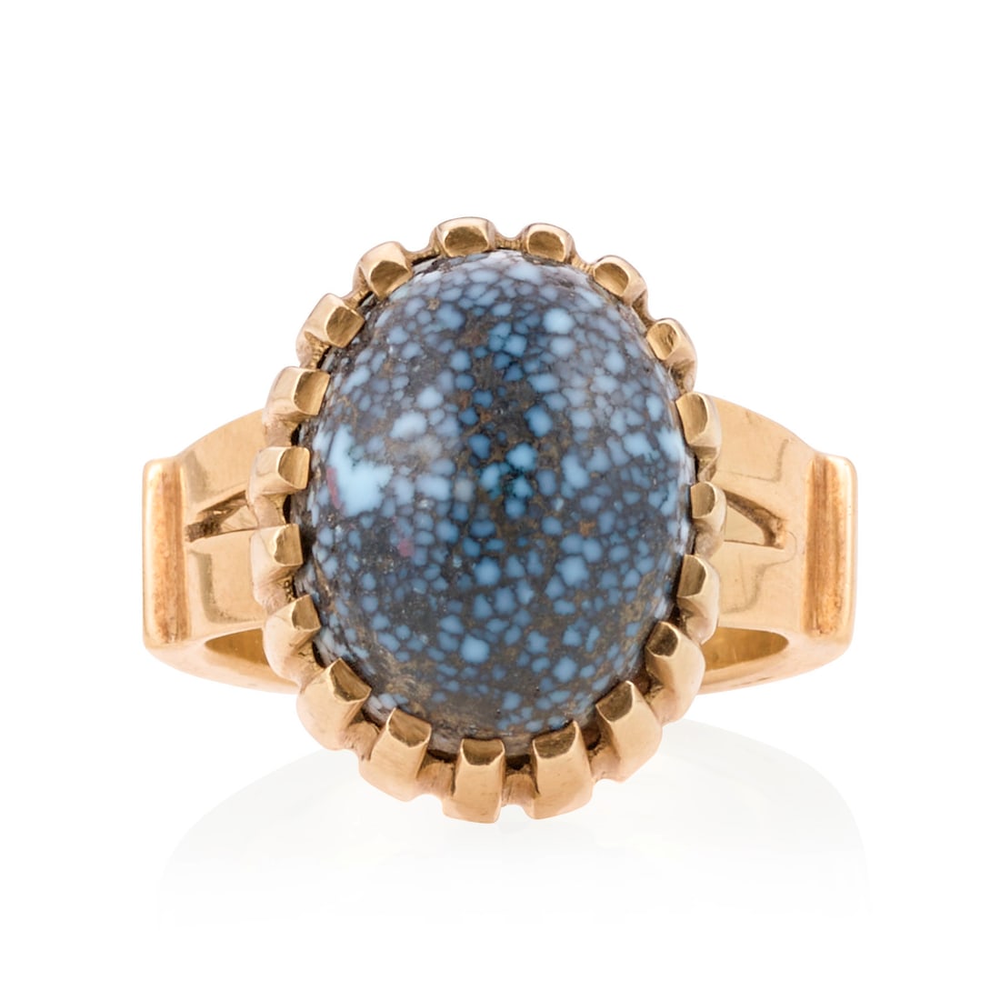 A Charles Loloma 18K gold and turquoise ring: Charles Loloma Hopi, (1921-1991), a ring in 18k gold, the split shank with raised bezel centering a solitary Lander Blue turquoise cabochon, maker's mark and assay at the interior base. ring size 7 1/