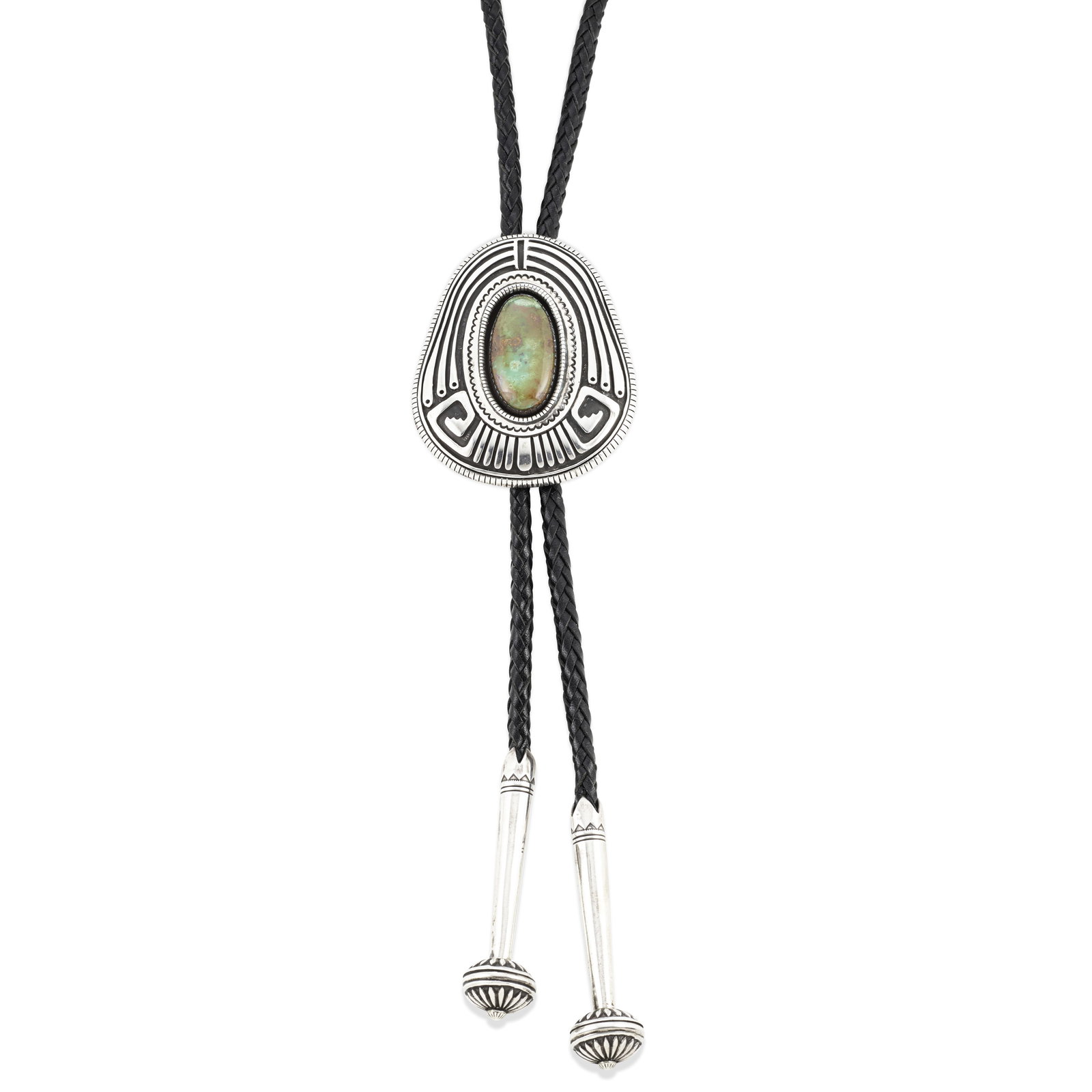 A Calvin Martinez bolo tie: Calvin Martinez Diné (Navajo), (b. 1960), a large silver bolo tie set with an oblong Royston turquoise cabochon, with heavy silver tips, on a black leather tie, bolo stamped with maker's mark an