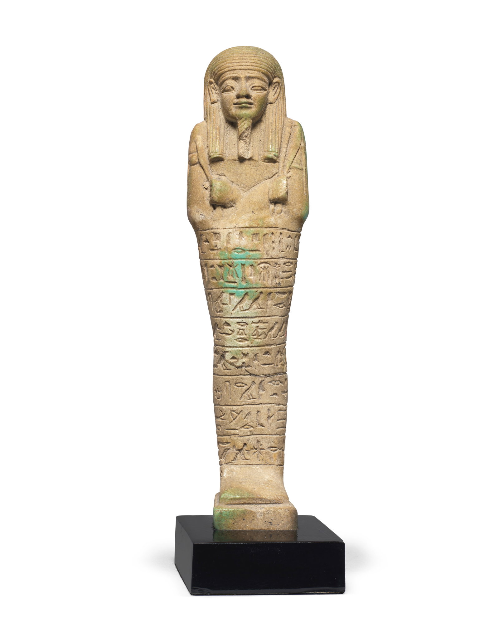 An Egyptian pale green glazed faience shabti for the Overseer of the Treasury, Psamtek, 'Good na...: An Egyptian pale green glazed faience shabti for the Overseer of the Treasury, Psamtek, 'Good name', Iahmes, born to Bastet-ir-dis Late Period, 26th Dynasty, circa 664-525 B.C. 19cm high Footnotes: P