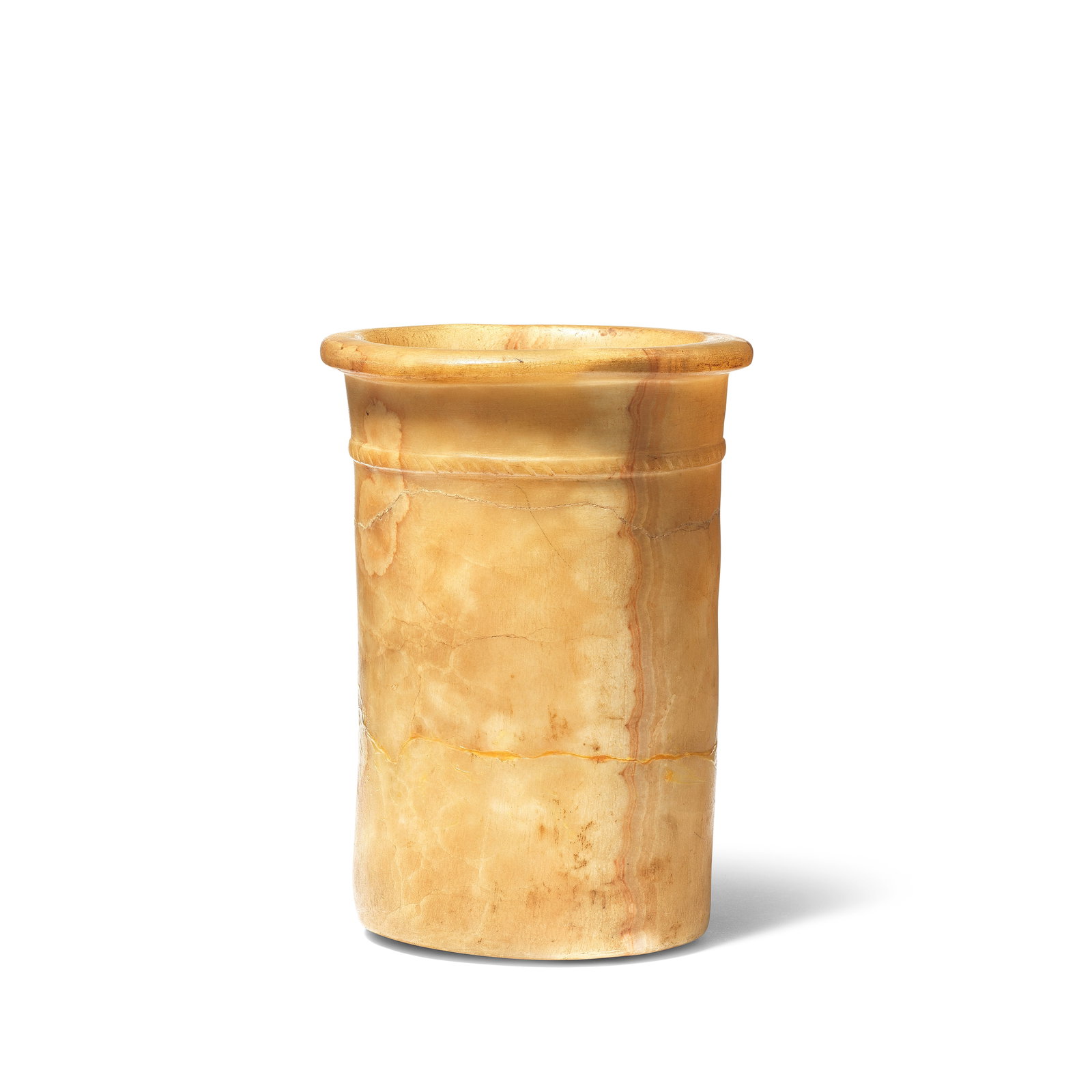 An Egyptian alabaster jar with rope-twist band: An Egyptian alabaster jar with rope-twist band Old Kingdom, circa 2686-2181 B.C. 22cm high, 16cm diam. Footnotes: Provenance Mary Stout Shaw (1880-1962) collection, UK, photographed in the family home