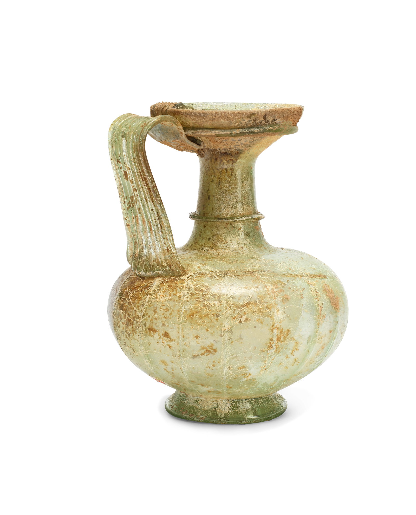 A large Roman green glass jug: A large Roman green glass jug Circa 4th Century A.D. 19cm high Footnotes: Provenance Dr. Jutaro Kawabe collection, Nagoya, Japan, formed during 1960s-1980s. With Hoshigaoka Gallery until late 1990s.