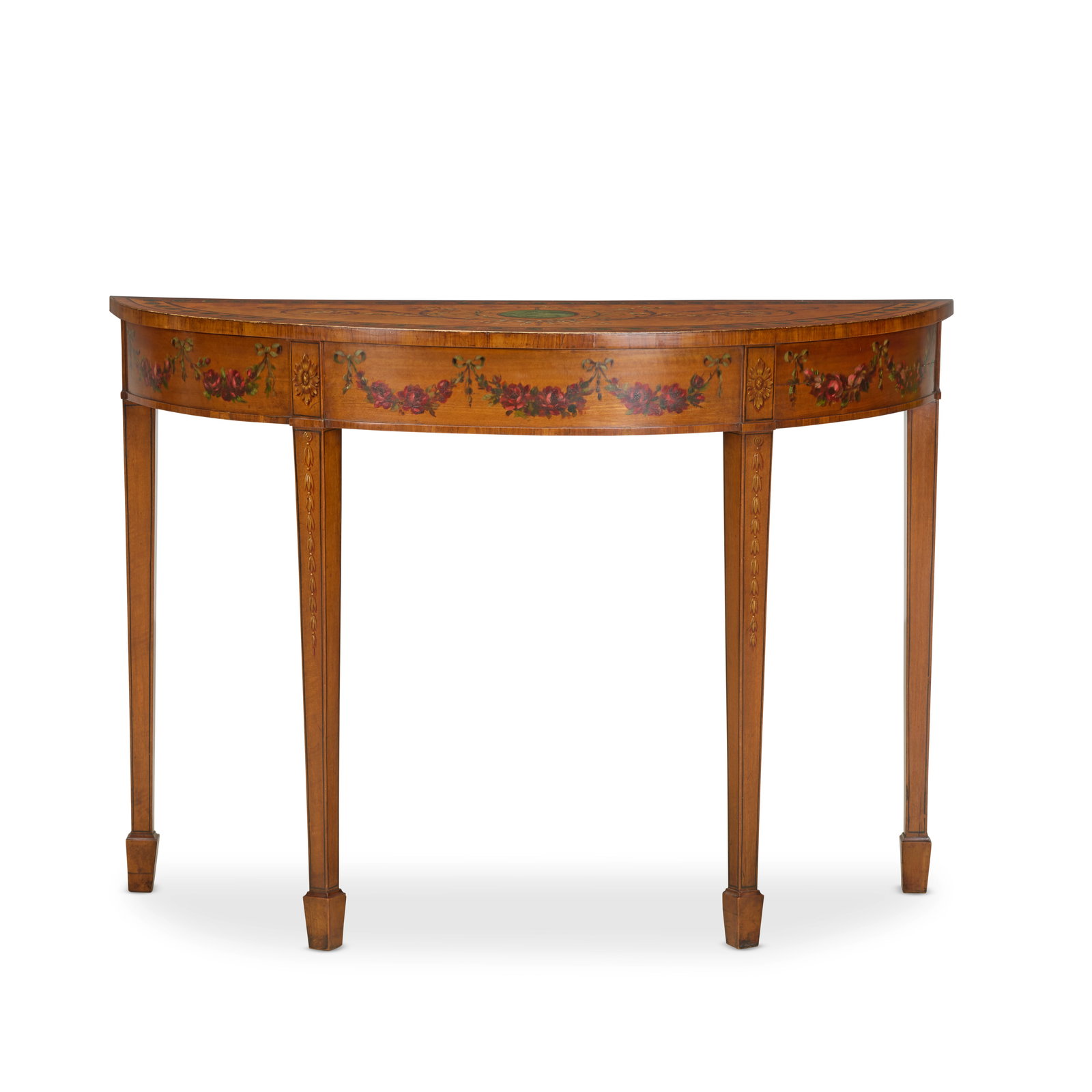 A George III and later satinwood and polychrome decorated pier tableLate 18th century and later: A George III and later satinwood and polychrome decorated pier table Late 18th century and later The demi-lune top painted with a central medallion enclosed by ribbon tied floral scrolls, with a peaco