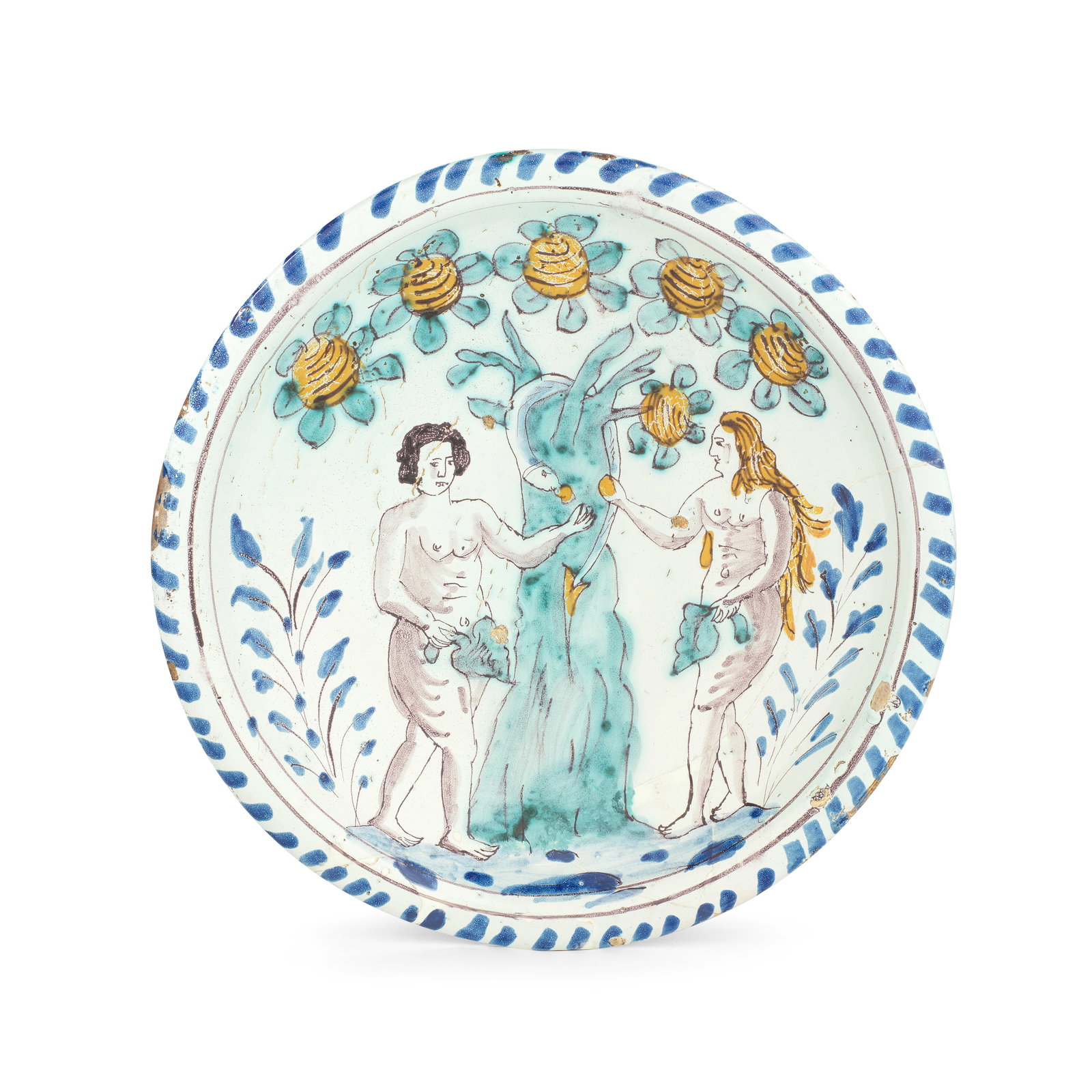 An English delftware Adam and Eve charger, circa 1680-1700: An English delftware Adam and Eve charger, circa 1680-1700 Probably Brislington, painted in manganese, blue, turquoise and ochre, a highly stylised tree bearing bright fruit, Eve offering one to Adam,