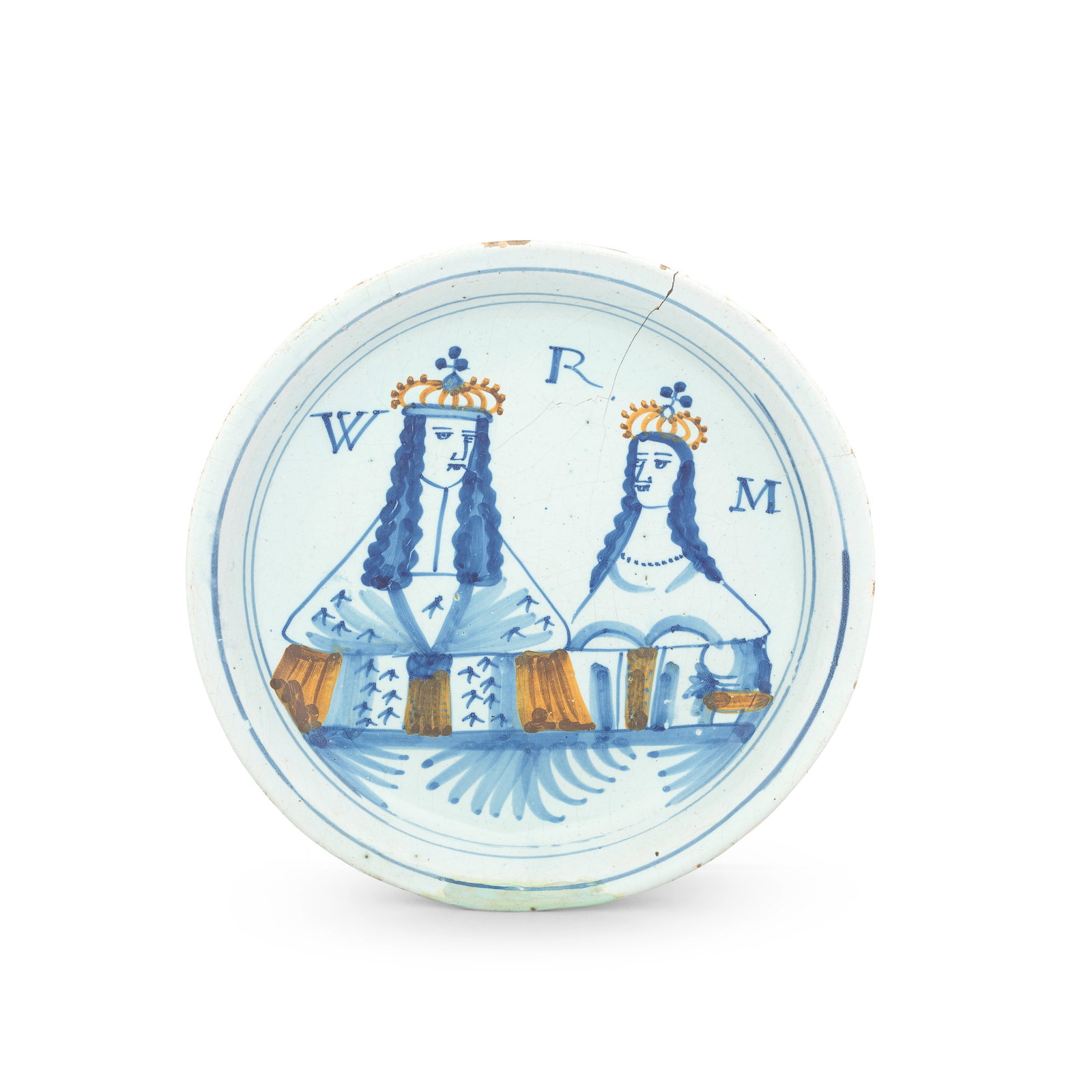 An English delftware Royal portrait plate, circa 1689-94: An English delftware Royal portrait plate, circa 1689-94 Of plain form without a footrim, painted in blue with stylised half-length portraits of King William III and Queen Mary, their crowns and eleme