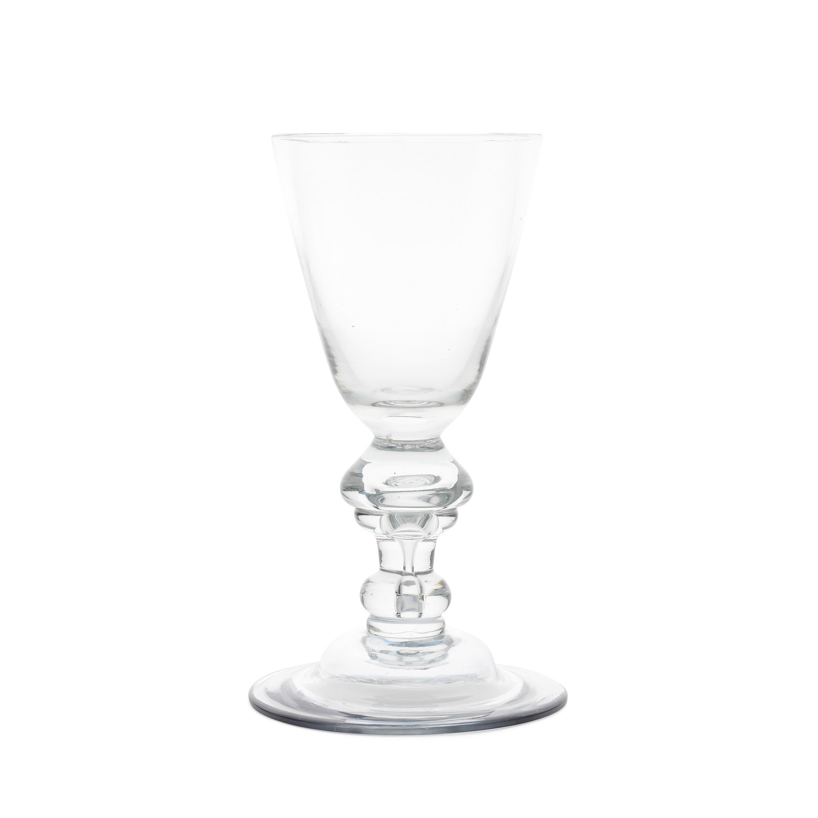 An exceptional mammoth drop-knopped heavy baluster goblet, circa 1715-20: An exceptional mammoth drop-knopped heavy baluster goblet, circa 1715-20 Of large proportions, the generous round funnel bowl with a solid base containing a tear, the stem with a large and wide teared