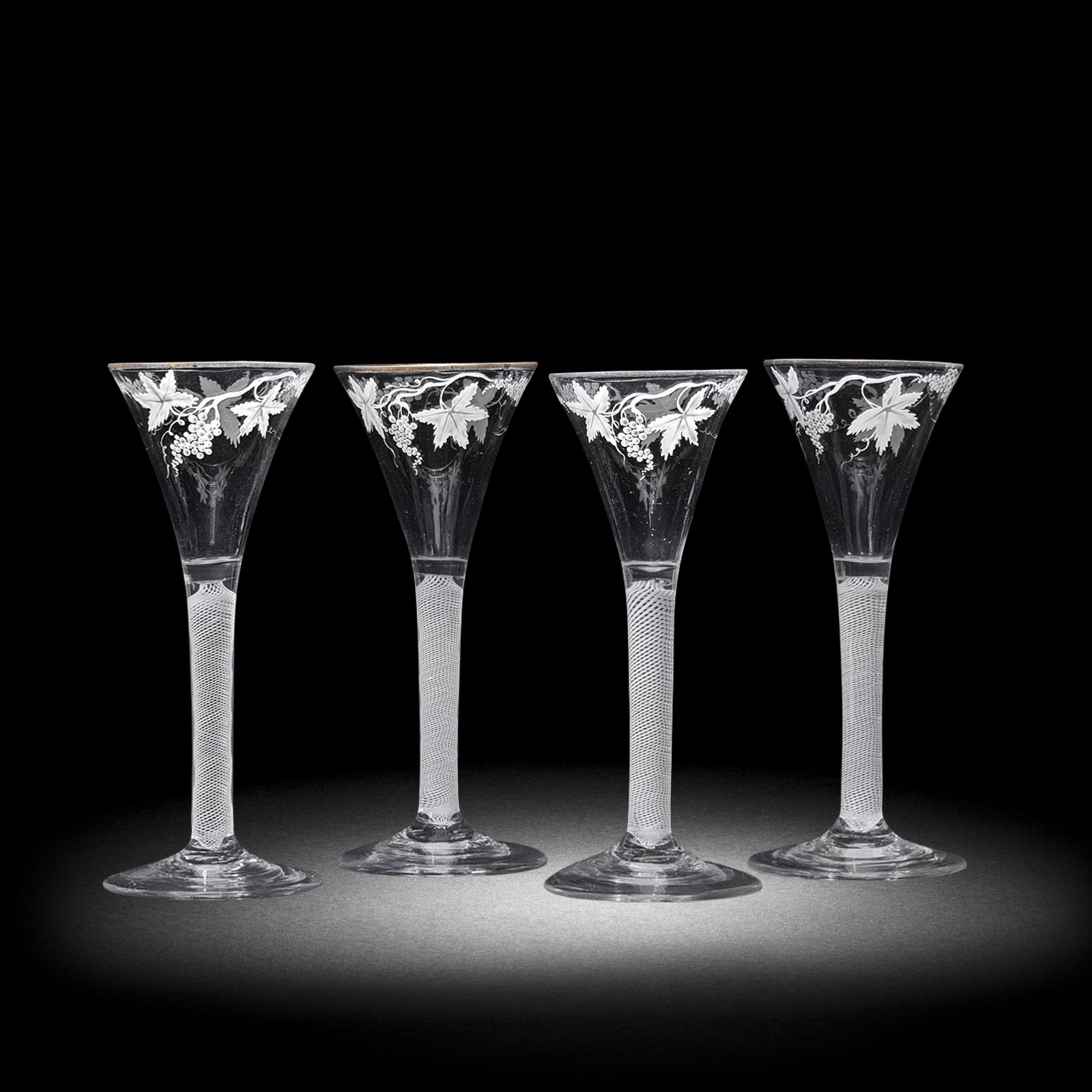 A matched set of four Beilby enamelled opaque twist wine glasses, circa 1765 (1 of 1)