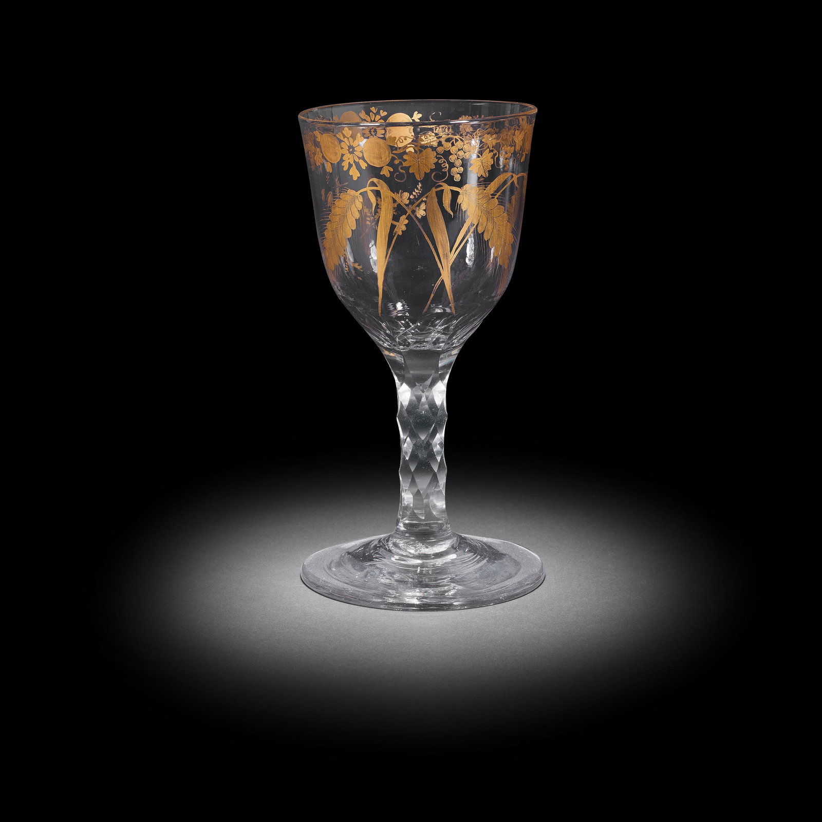 A very rare Giles gilded facet stem ale or cider goblet, circa 1770: A very rare Giles gilded facet stem ale or cider goblet, circa 1770 Decorated in the London workshop of James Giles, the generous ogee bowl decorated with three crossed ears of barley, scattered flora