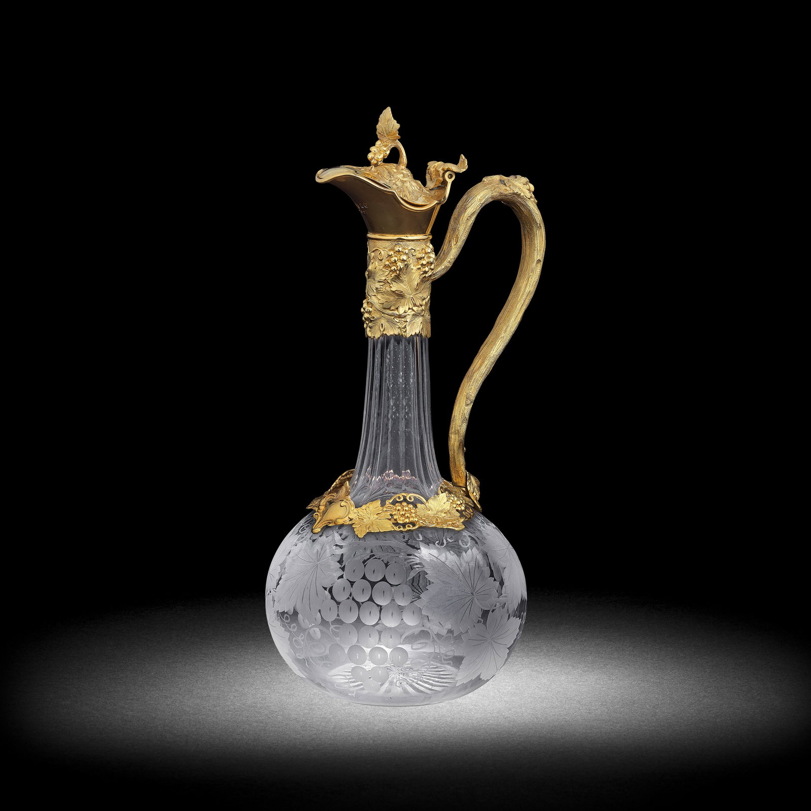 A silver-gilt mounted engraved glass claret jug, dated 1866 (1 of 1)