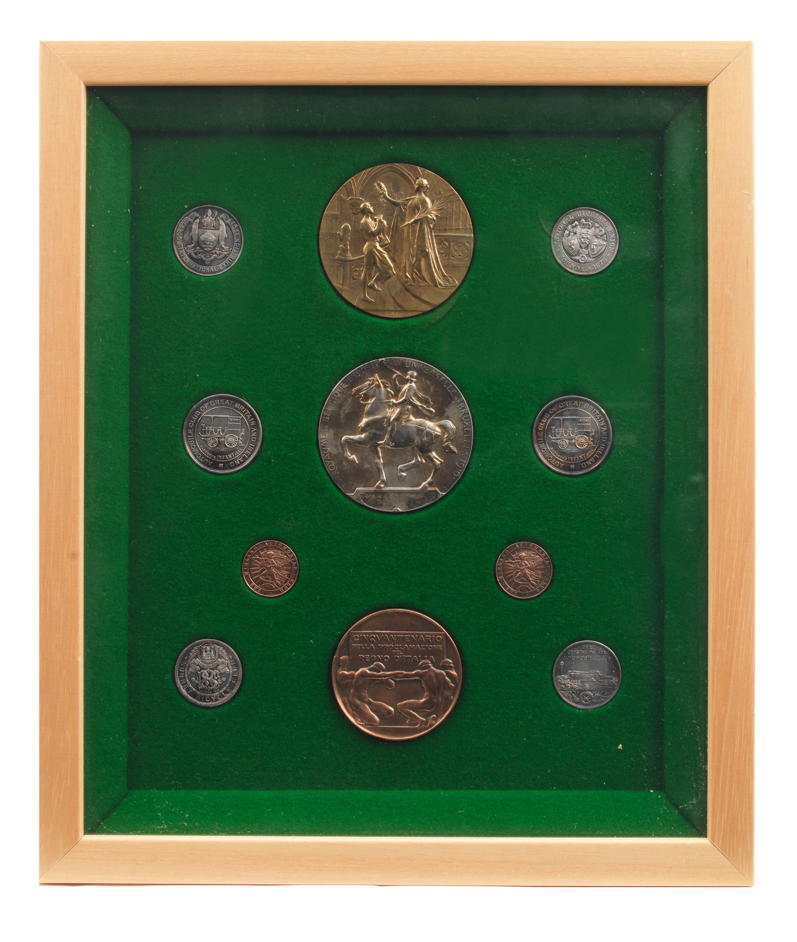 A framed display of 11 early motoring and cycling medallions awarded to Selwyn Francis Edge, (1 of 1)