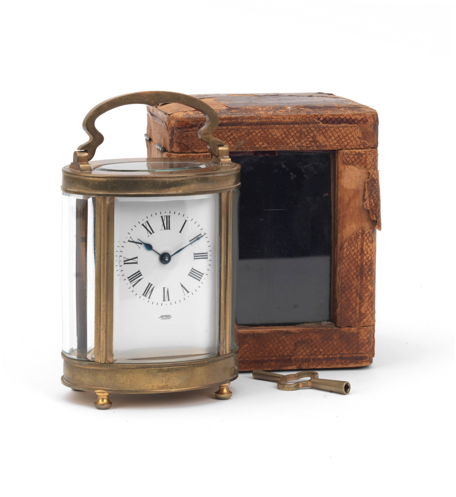 S.F.Edge's cased Asprey brass-cased oval carriage clock, early 20th Century, ((2)) (1 of 1)