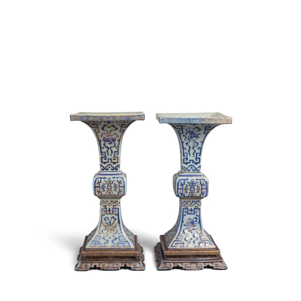 A PAIR OF CELADON-GROUND BLUE-AND-GILT-DECORATED 'BAJIXIANG' GU-FORM VASES Late 18th/early 19th ... - 2