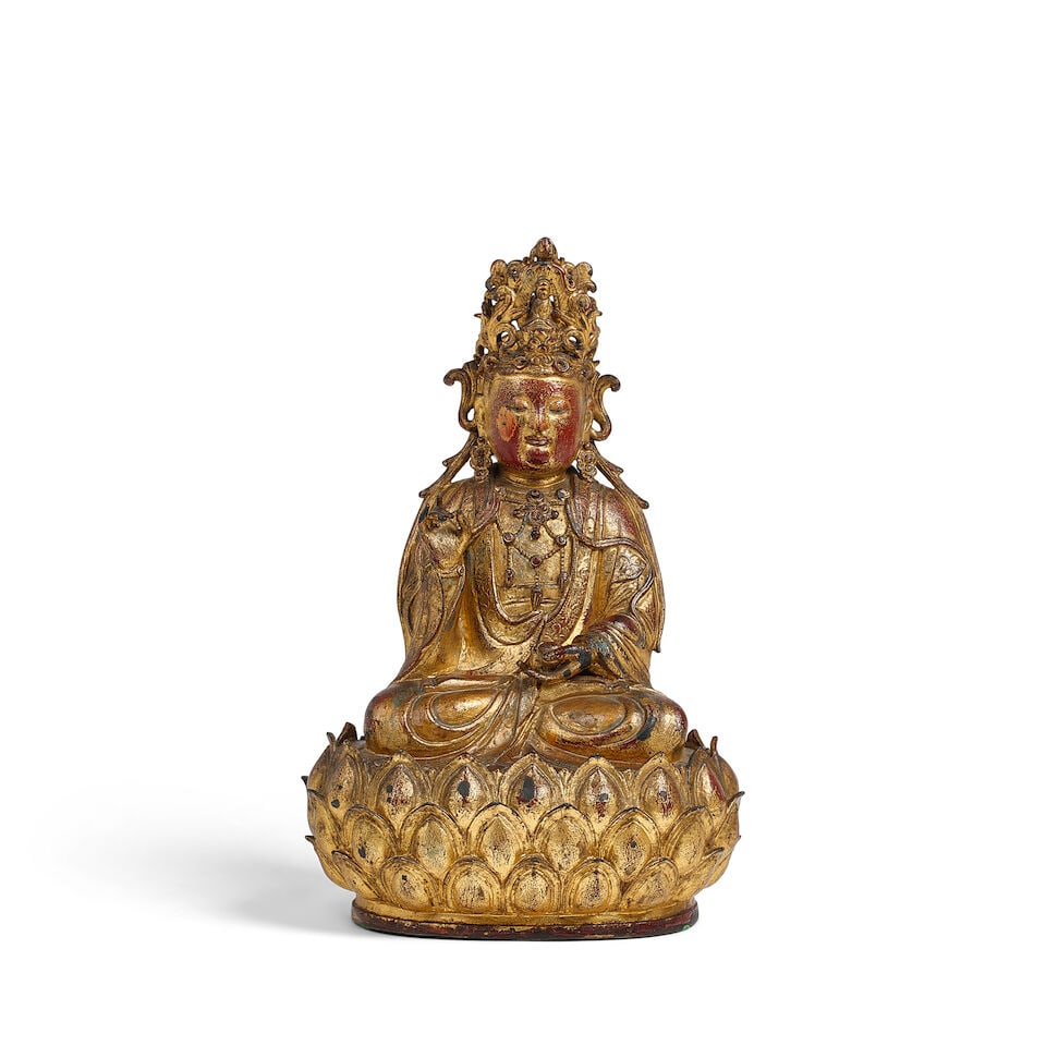 A GILT AND LACQUERED BRONZE FIGURE OF SEATED GUANYIN 17th century (gilt lacquered wood stand) (1 of 2)