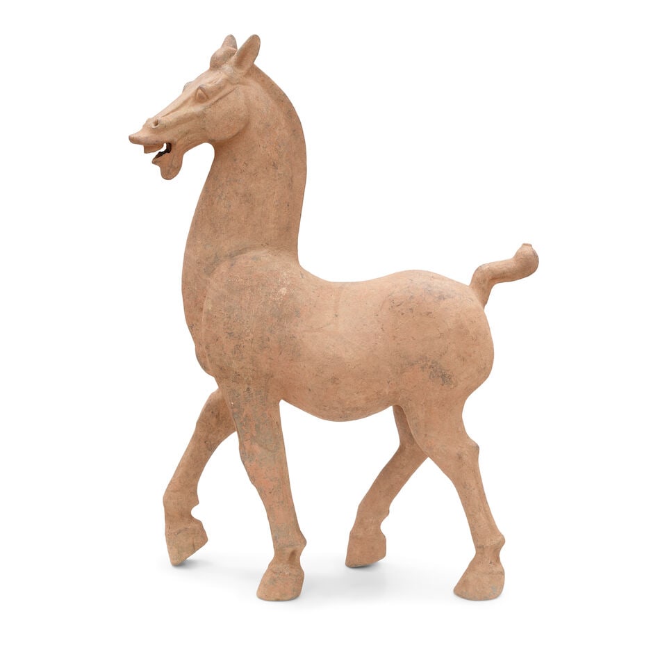 A LARGE POTTERY FIGURE OF A PRANCING HORSE Han-style (1 of 4)