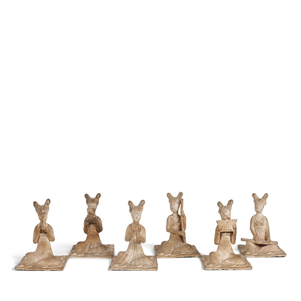 A GROUP OF SIX POTTERY FIGURES OF FEMALE MUSICIANS Tang dynasty (6): A GROUP OF SIX POTTERY FIGURES OF FEMALE MUSICIANS Tang dynasty Height of tallest 6 3/4in (17cm) (6). Footnotes: 唐