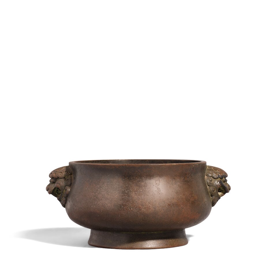 A BRONZE BOMBÉ-FORM CENSER Xuande mark, Qing dynasty (wood stand) (1 of 2)