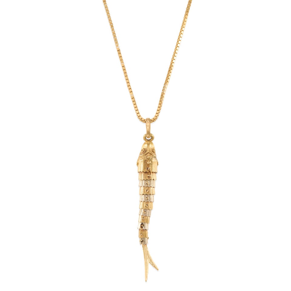 18K GOLD ARTICULTATED FISH PENDANT NECKLACE: 18K GOLD ARTICULTATED FISH PENDANT NECKLACE • 18k yellow and white gold • Maker's mark • Length 20 in., fish pendant measures 2 x 5/16 in. • Estimated gross weight: 11.3