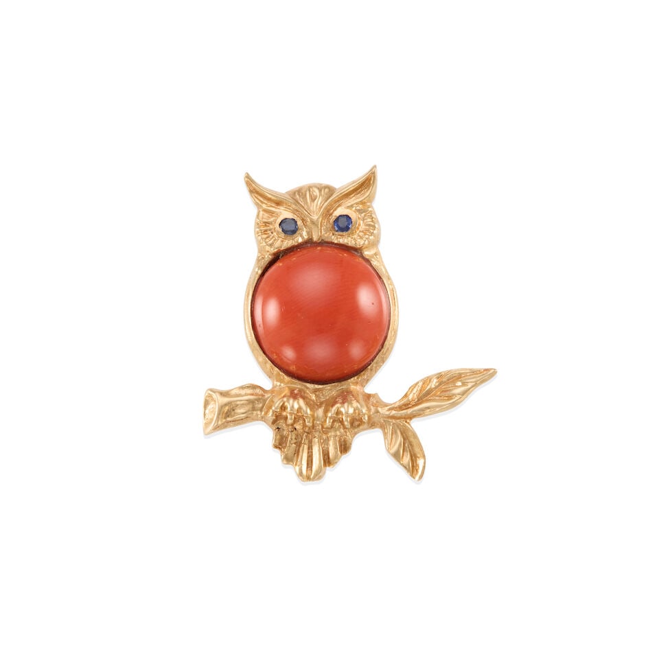 14K GOLD AND CORAL BROOCH: 14K GOLD AND CORAL BROOCH • 14k yellow gold • 2 round sapphires weighing approximately 0.02 - 0.08 carat total • 1 round coral cabochon measuring approximately 13.25 - 13.48 mm