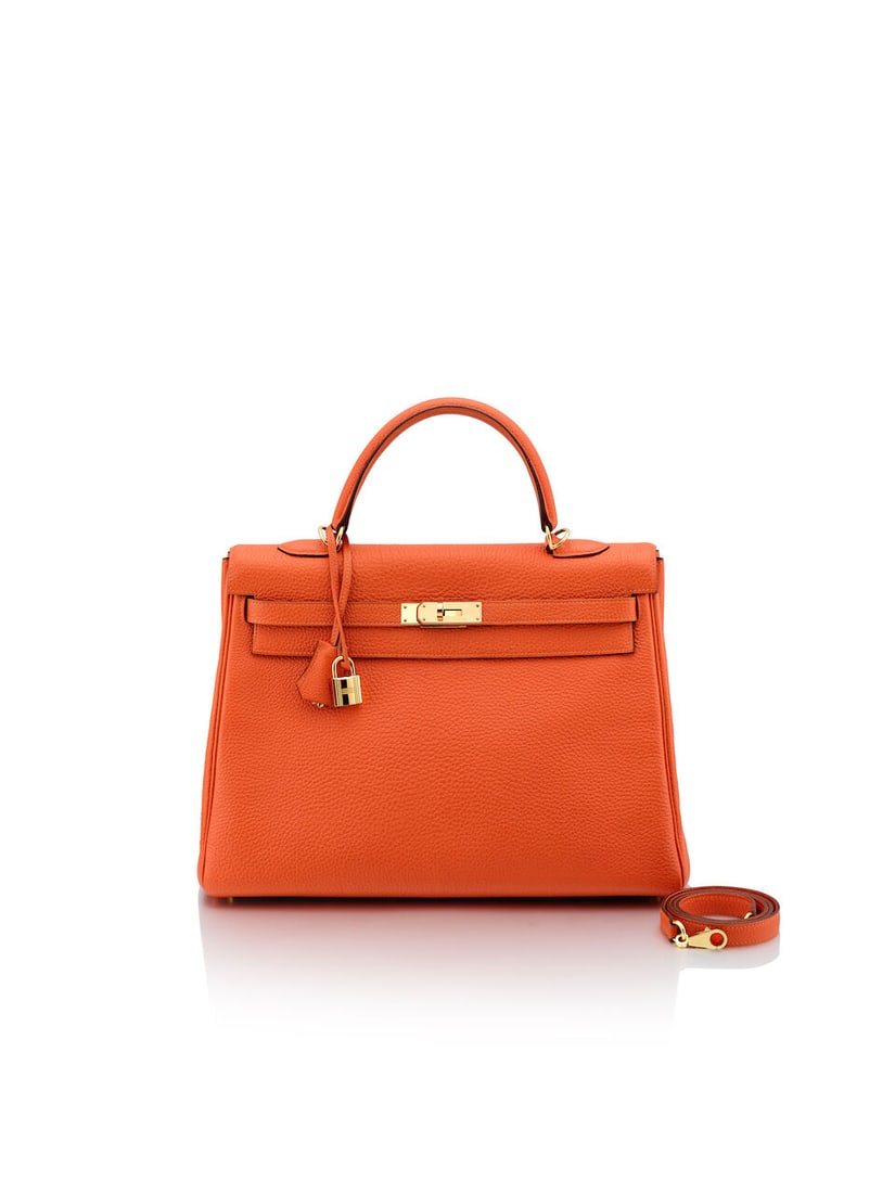 HERMÈS: ORANGE CLEMENCE RETOURNE KELLY 35 WITH GOLD HARDWARE 2010 (Includes strap, keys, pa...: HERMÈS: ORANGE CLEMENCE RETOURNE KELLY 35 WITH GOLD HARDWARE 2010 愛馬仕：橙色CLEMENCE牛皮內縫KELLY 35厘米配黃&