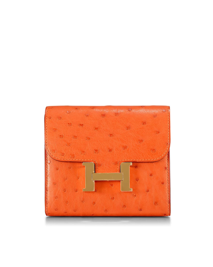 (NO RESERVE) HERMÈS: TANGERINE OSTRICH CONSTANCE COMPACT WALLET WITH GOLD HARDWARE 2017 (In... (1 of 4)